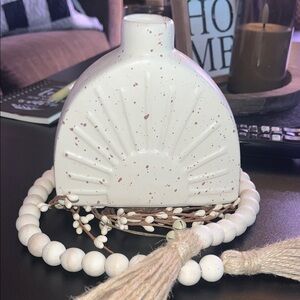 Small, White Speckled Ceramic Vase , no decor included.